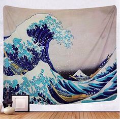 the great wave tapestry is hanging on a wall