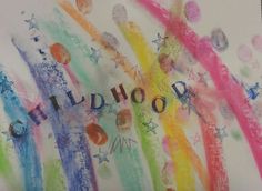 a child's drawing with the words childhood painted on it and stars in the background