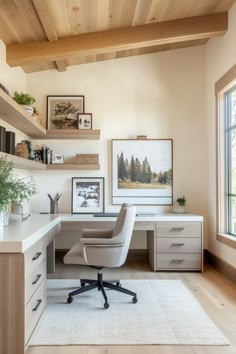 a home office with white furniture and wood ceilinging, along with open shelving