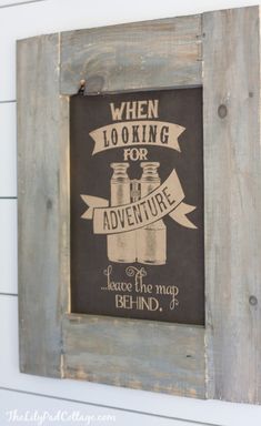 a sign that is hanging on the side of a building saying when looking for adventure, place the map behind it