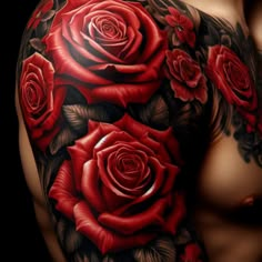 a man's arm with red roses on it