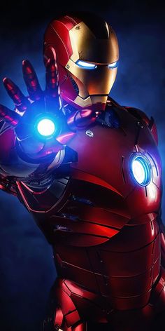 an iron man with glowing eyes and hands