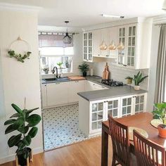 the kitchen is clean and ready to be used for cooking or dining room furniture,