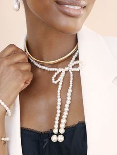 Materials 18k Gold Plated, Brass, Acrylic Pearl Length 11" with a 5" chain extender Bow Length Hangs 6" Closure Lobster Clasp Pearl Bow Necklace, Pearl Bow, Back Necklace, Bow Necklace, Chain Extenders, Chain Anklet, Gold Plated Chains, Lobster Clasp, Anklets