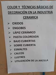 a sign that is posted on the side of a wall with words in spanish and english