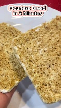 two pieces of bread on a white plate with the words flourless bread in 2 minutes