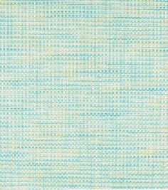 a blue and green checkered fabric textured with small dots on the top half