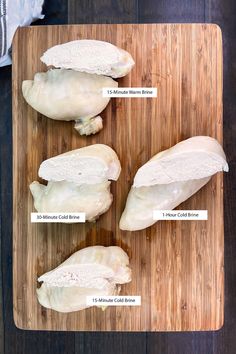 four different types of raw chicken on a wooden cutting board with instructions for how to cook them