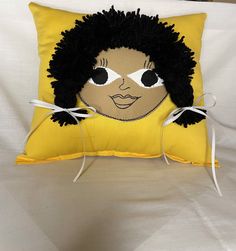 "13\" x11.5\" Handmade Rag Doll Pillow with Honey face, Black hair 2 ponytails. Detailed on a yellow color fabric material. Yellow Pillow, B/Girl w/Ponytails." 2 Ponytails, Doll Pillow, Cute Mask, Honey Face, Yellow Pillows, Rag Dolls Handmade, Soft Dolls, Fabric Paint, Rag Doll