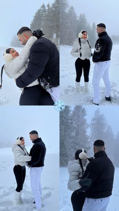 two people standing in the snow with their arms around each other and one person kissing