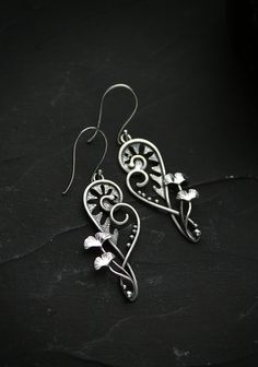 ITEM DESCRIPTION: Size H 6 x W 2 cm (2 x 2/3 inches) with closure. Weight - 3 g of each other, very light and comfortable. Absolutely wonderful and unique silver earrings with fern koru and ginkgo leaves. These plants intertwine, grow and look almost alive. I made these botanical earrings without gemstones. But you can order them with different gemstones if you want. Jewelry will come to you in a gift box - ready for gifting. More jewelry with fern leaves in my shop: https://www.etsy.com/shop/Ur Handmade Silver Botanical Earrings, Handmade Leaf-shaped Sterling Silver Jewelry, Nature-inspired Leaf-shaped Jewelry With Matching Earrings, Leaf-shaped Jewelry Gift, Handmade Sterling Silver Leaf-shaped Jewelry, Unique Nickel-free Leaf-shaped Jewelry, Nickel-free Leaf-shaped Nature-inspired Earrings, Nature-inspired Metal Jewelry With Matching Earrings, Silver Leaf-shaped Handmade Earrings