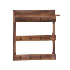 a wooden shelf with three hooks on it