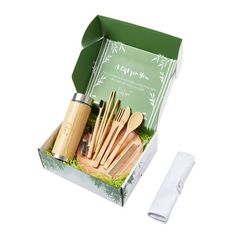 the bamboo utensils are in a green box