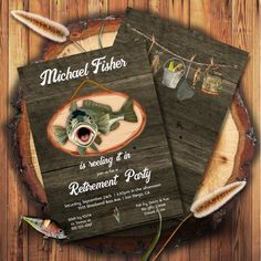 two fishing themed birthday party cards on a wooden table with fish and lures in the background