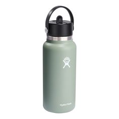 a green water bottle with a black lid and an emblem on the front, sitting against a white background