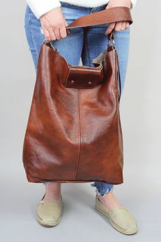 "Oversized bag - large leather tote bag -XXL handbag BROWN LEATHER BAG Height: 46 cm / 18.2\" Width: 43 cm / 17\" Width at the base: 32 cm / 12.6\" Min handle drop: 20 cm / 10.2\" Length of handle: 44 cm / 17.3\" Long strap: max 110 cm / 43.5\" Depth: 13 cm / 5.1\" Large and stylish tote bag made from high quality leather. Spacious interior provides room for all the daily essentials and more. This bag is perfect as your everyday bag, which can fit an IPAD, A4 files, books, magazines, cosmetic ba Large Brown Shoulder Bag For Everyday, Large Leather Bag With Double Handle, Large Leather Satchel Bag, Large Brown Satchel For Everyday Use, Brown Large Satchel For Everyday Use, Large Brown Bag For Everyday Use, Large Leather Satchel For Shopping, Large Leather Bag For Daily Use, Large Brown Everyday Bag