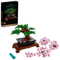 a lego bonsai tree is shown in front of its box and instructions to build it