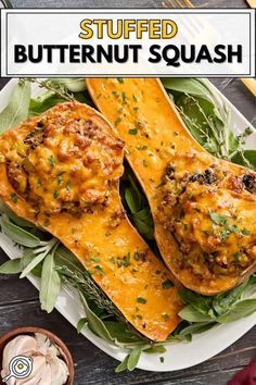 stuffed butternut squash on a plate with spinach leaves