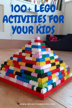 a lego pyramid made out of blocks on top of a wooden table with text overlay that reads, 100 lego activities for your kids