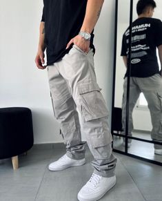 Men's College Outfit | Men's College Fashion | Men's Cargo Pants Via: damelosiempre (Instagram) !!LINK TO PRODUCT IN PIN!! #affiliateproduct *As an Amazon Associate I earn from qualifying purchases* Cargoes Outfit Men, Grey Cargos Outfits, Cargo Grey Pants Outfit, Men Cargo Pants Outfit Fashion, Gray Cargo Pants Outfit Men, Cargo Pants Outfit Men Casual, Light Grey Cargo Pants Outfit, Cargo Trousers Outfit Men, Grey Cargo Pants Outfit Men