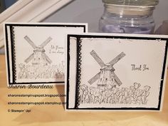 two cards with an image of a windmill on them and a jar full of flowers