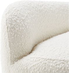 a close up of a white couch cushion