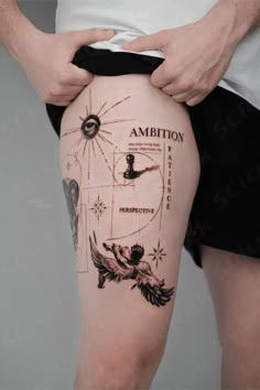 a man's thigh with tattoos on it and the words, ambiton