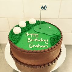 a birthday cake with a golf theme on it