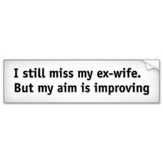 a sticker that says i still miss my ex - wife but my aim is imppoving