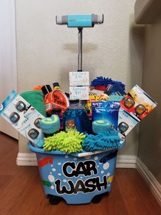 a car wash bucket filled with cleaning supplies