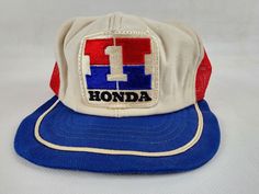 Up for auction, pre-owned vintage Honda Number One Team Racing Adjustable Trucker Hat by Hondaline.  PLEASE NOTE: Item is in Good condition, with signs of age. Looks barely worn. No holes or tears. Inside looks clean but foam seems fragile from age, snaps in good shape. Brim is misshaped, material is not super sturdy. Fits 6 7/8 to 7 1/2. May be lightly dusty in spots, color slightly faded, maybe some fuzz from storage. Please review all photos above before bidding, any questions please ask, tha Men Drip, Vintage Motocross, Accessories Ideas, Pink Flamingo, One Team, Pink Flamingos, Adjustable Hat, Hats Vintage, Trucker Cap