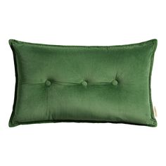 a green pillow with buttons on the front and back, sitting against a white background