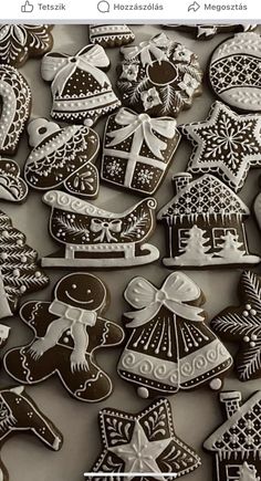 an assortment of decorated christmas cookies on display