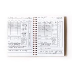 an open notebook with some writing on the pages and numbers in each page, which are lined