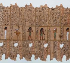 an ancient egyptian painting with women and men in bikinis on it's side