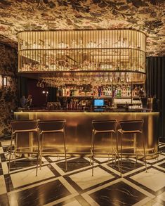 the bar is decorated in gold and black