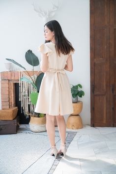 "*DHL shipping upgrade is available at check out process. Shipping part by DHL will take 3-6 days only. Production time may take around 2-3 weeks. If this is in rush you can convo us to make it sooner.:) New in:) Alita dress 🍦in cream color🍦 A sweet feminine look party dress which featured ruffle at sleeve, V shape neck bust line with flare swing skirt shape. This is lovely one for formal work teaming with a high heel or wear to a perfect summer day out to town. This is for all, grab one and y Beige Fit And Flare A-line Midi Dress, Beige A-line Fit And Flare Midi Dress, A-line Sleeveless Dress For Wedding Guest, Beige A-line Midi Dress For Wedding, Feminine Cream Midi Dress For Garden Party, Chic Sleeveless Apricot Dress, Chic Beige Midi Dress For Wedding, Beige A-line Summer Dress, Chic Beige Wedding Dress