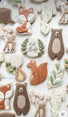 decorated cookies with woodland animals and trees