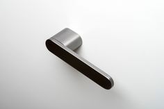 a door handle on a white wall