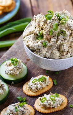 cucumber and crackers with tuna salad in a bowl