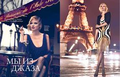 a woman in black and white dress standing next to the eiffel tower at night