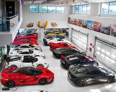 a room filled with lots of different colored cars