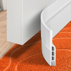 a close up of a door handle on an orange rug