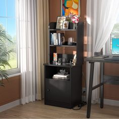 a computer desk in front of a window with curtains on the windowsill and an open bookcase next to it