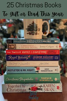 a stack of books with the title 25 christmas books to get on read this year