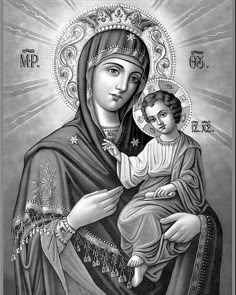 the virgin mary and child jesus in black and white, with sunburst above