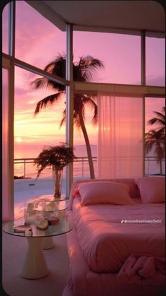 a living room filled with furniture next to a window covered in pink curtains and palm trees