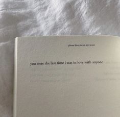 an open book with the words you were the last time i was in love with anyone