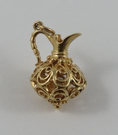 "This is a vintage \"Reticulated Jug\" 14 karat gold charm for a charm bracelet. It weighs 3.75 grams and measures 5/8\" x 7/8\", marked \"14K\" All charms come with a split ring to attach to a bracelet. We have hundreds of charms in stock. If you don't see what you are looking for in our shop please contact us as it is likely we have it. Inventory #G3218" Split Rings, Small Rings, Split Ring, Gold Charm, 10k Gold, Vintage Charms, Heart Charm, Gold Filled, Split