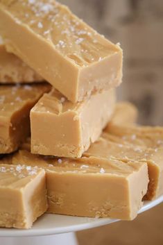 several pieces of peanut butter fudge on a white plate